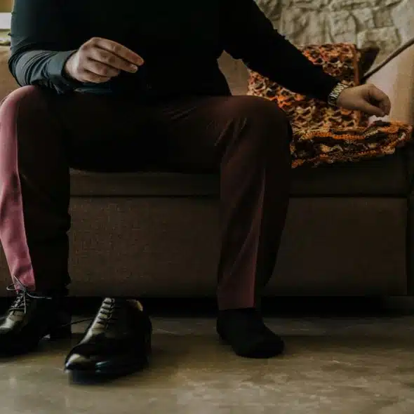 A man about to wear his leather shoes.