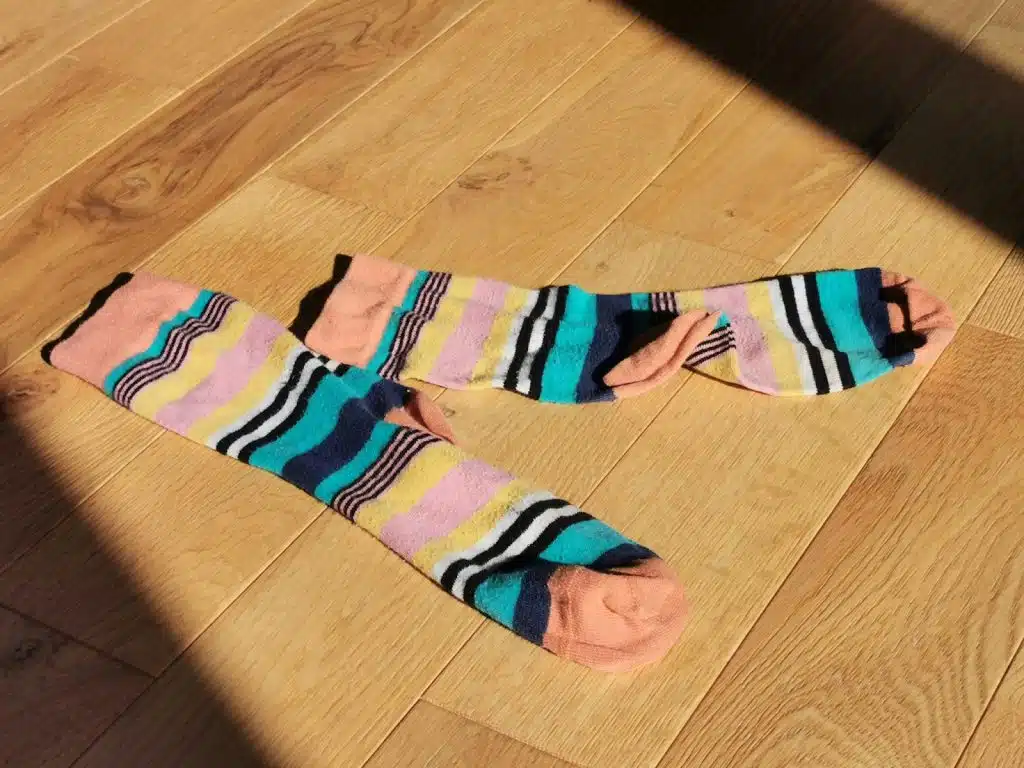 A patterned socks on the floor