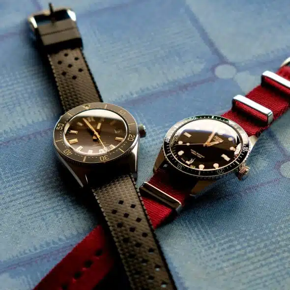 A black Seiko and a red Oris automatic watch.