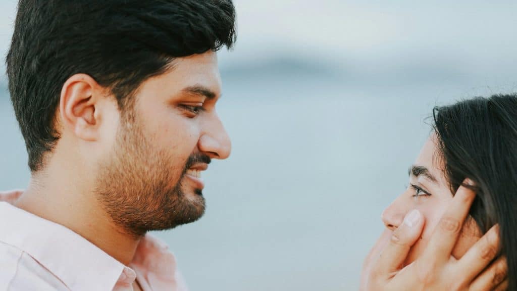 A couple looking at each other with affection.