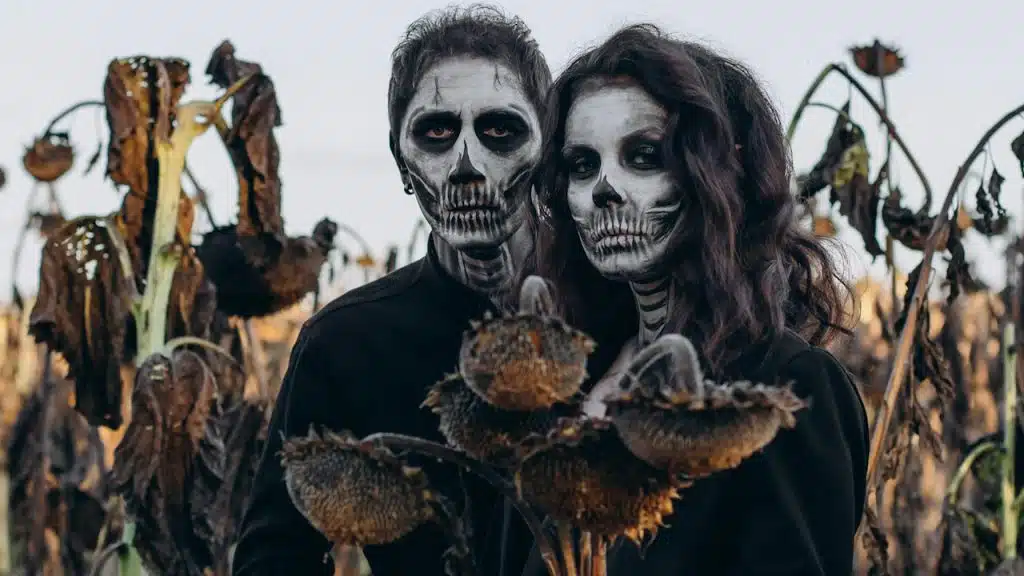 A couple dressed like skeletons.