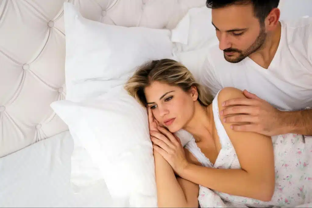 A man trying to speak with woman