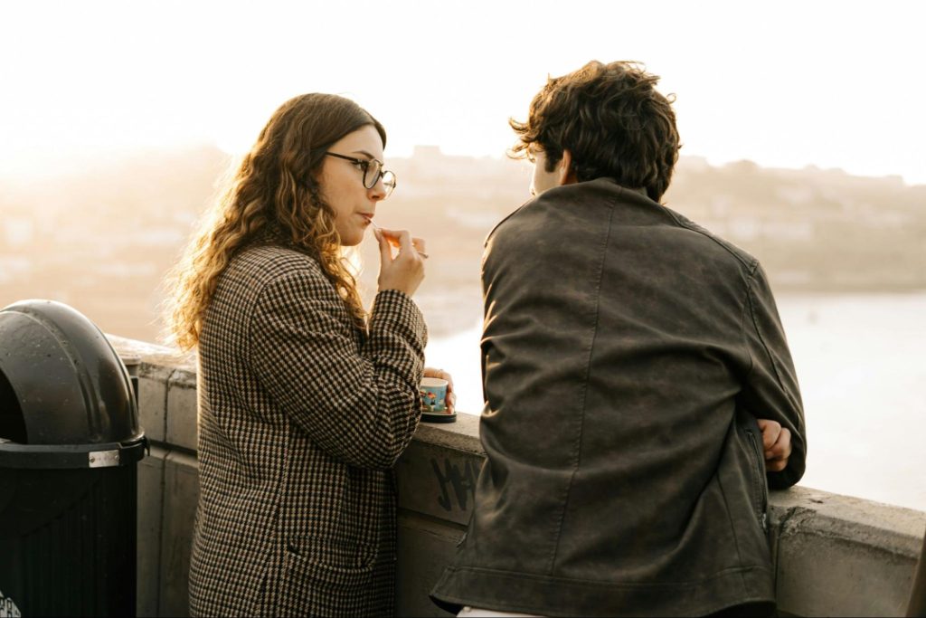 A man and woman talking