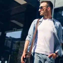 Stylish man showcasing rugged outdoor look with classic accessories