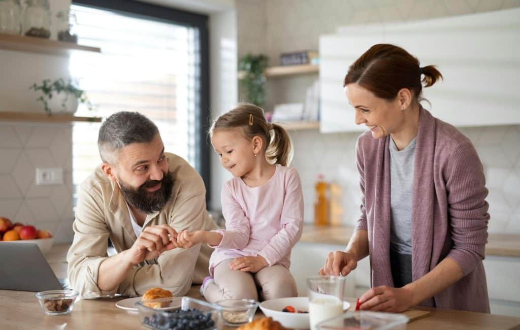 A man and woman at the kitchen
