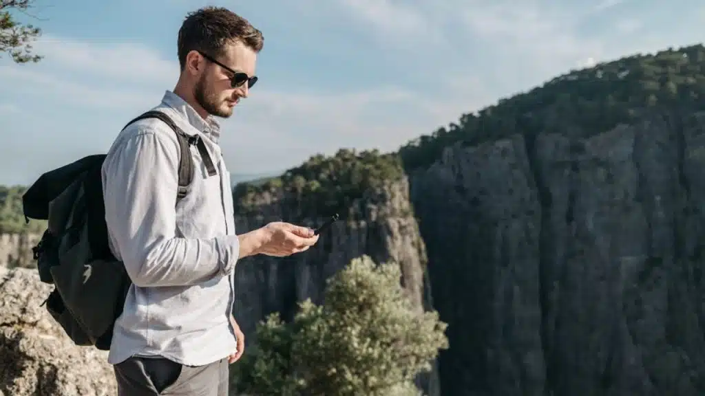 Rugged canvas backpack with leather straps on a man outdoors