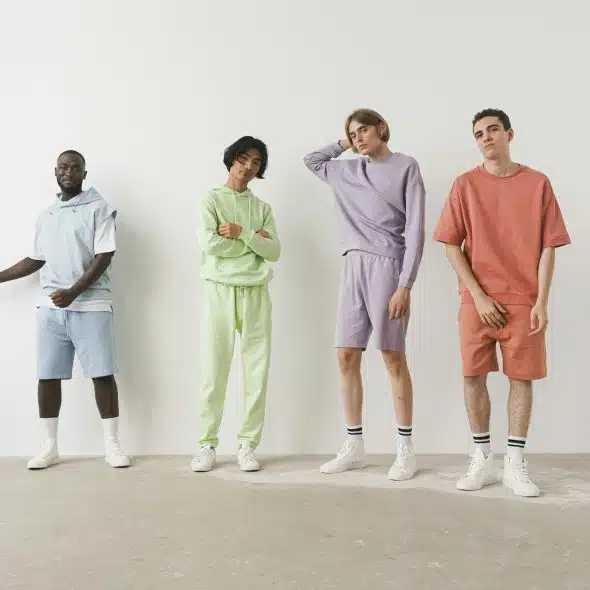 Four Male Models Posing against a White Background