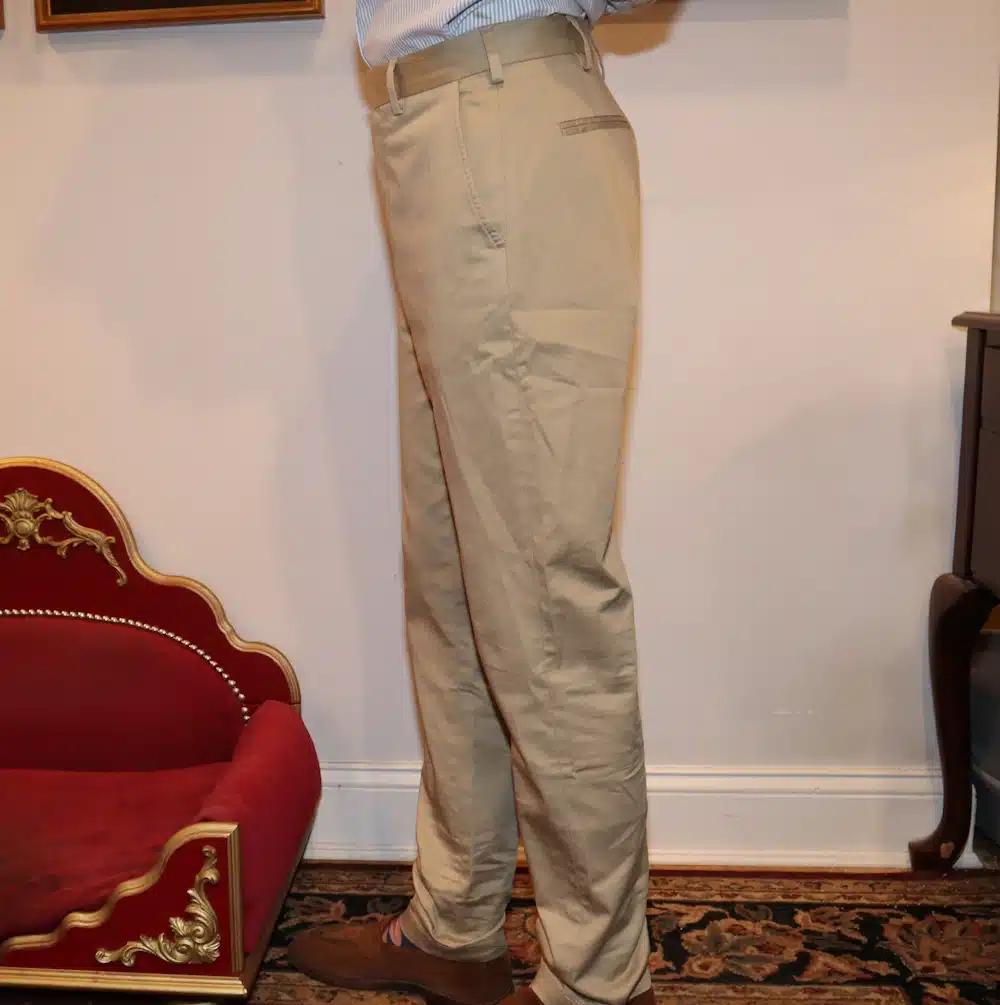Karlton Miko Tyack wearing The Asket Slim Chinos with brown shoes
