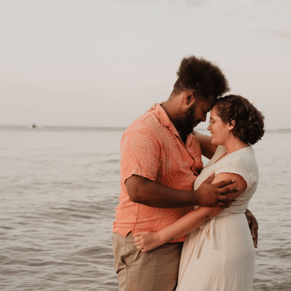 Man and woman holding each other