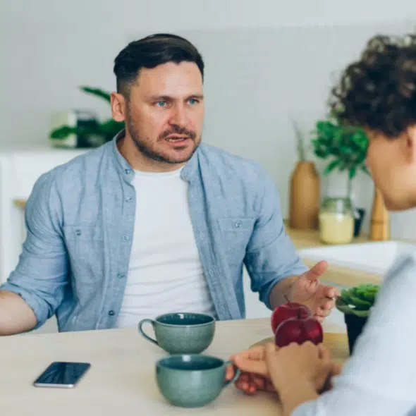 A man berating his partner