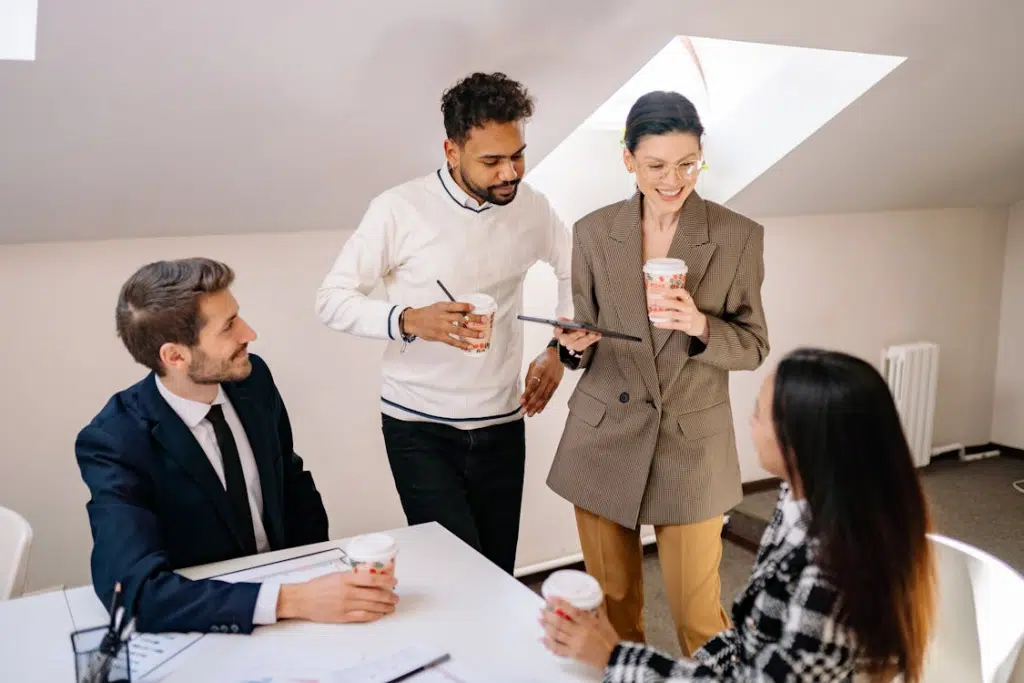 Smiling Young People Coworking in Office
