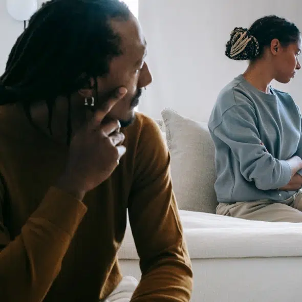 A man and a woman sitting