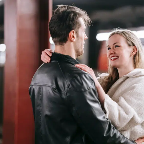 A couple at a train station